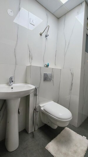 Bathroom in 3 BHK Apartment at Motia Harmony Greens, Kishanpura – for Sale
