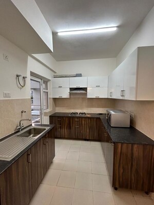 Kitchen in 4 BHK Apartment at M3M Woodshire, Sector 107 – for Rent
