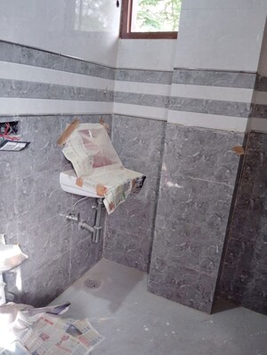 Bathroom in 2 BHK Apartment at Vasant Enclave – for Rent
