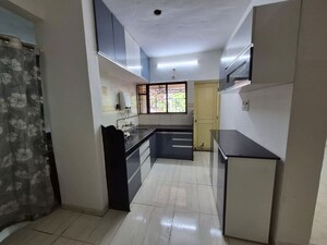 Kitchen in 2 BHK Apartment at Simran Corner, Pimple Saudagar – for Rent