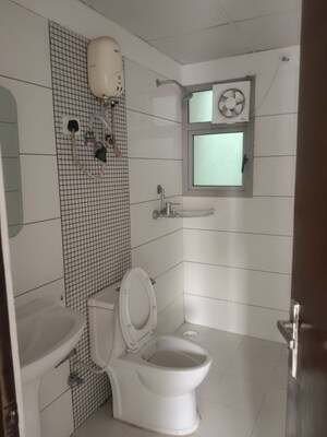 Bathroom in 3 BHK Apartment at Gulshan Bellina, Sector 16 Greater Noida – for Rent