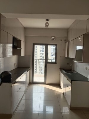 Kitchen in 3 BHK Apartment at Gulshan Bellina, Sector 16 Greater Noida – for Rent