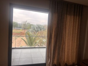 Balcony in 3.5 BHK Villa at Manchirevula – for Rent