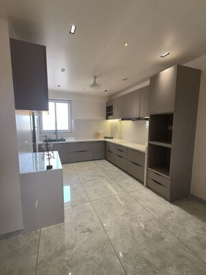 Kitchen in 4 BHK Apartment at Sopan 55, Bhayli – for Sale