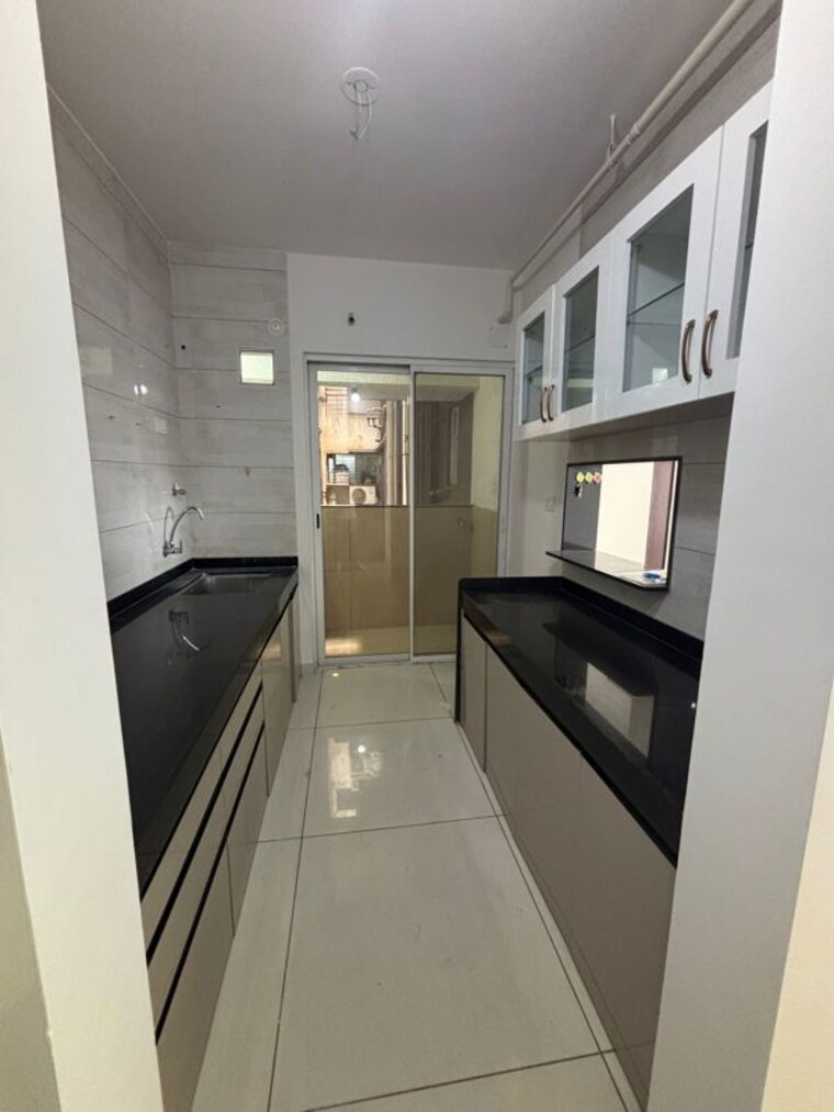 Kitchen, sai-prasad-chs-kharadi 2.5 Bedroom 1100 Sq.Ft. Apartment In Kharadi Pune 10481343