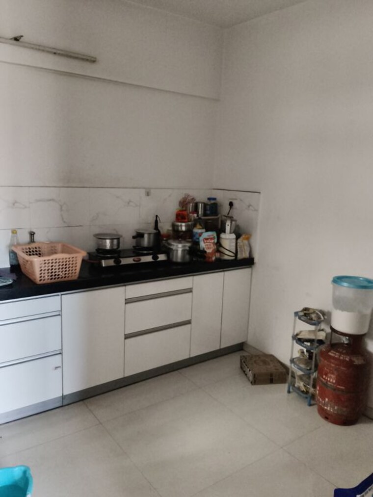 Kitchen, urban-nest 2 Bedroom 720 Sq.Ft. Apartment In Undri Pune 10481349