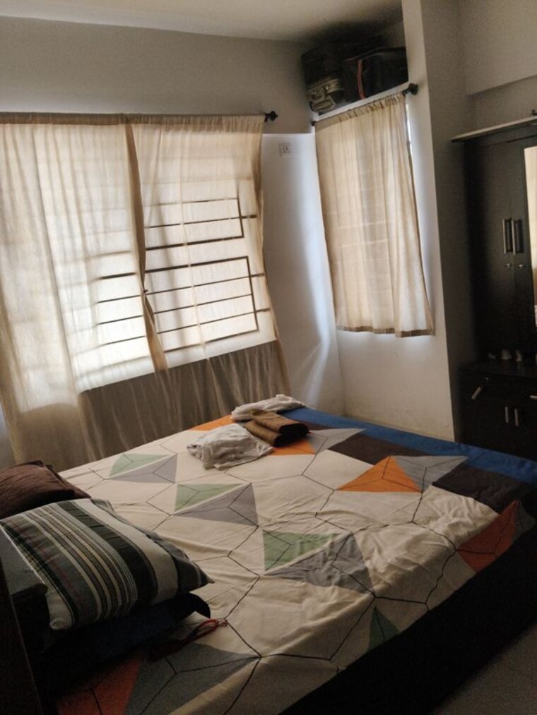 Bedroom, urban-nest 2 Bedroom 720 Sq.Ft. Apartment In Undri Pune 10481349