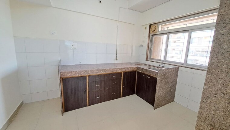 Kitchen, damji-shamji-mahavir-spring-tulip-phase-1 3 Bedroom 950 Sq.Ft. Apartment In Pokhran Road No Two Thane 10481479