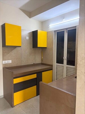 Kitchen in 1.5 BHK Apartment at Dosti West County, Balkum Pada – for Rent