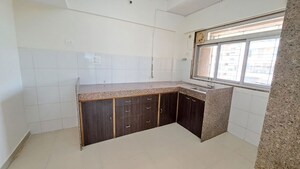 Kitchen in 3 BHK Apartment at Damji Shamji Mahavir Spring Tulip Phase 1, Pokhran Road No Two – for Rent