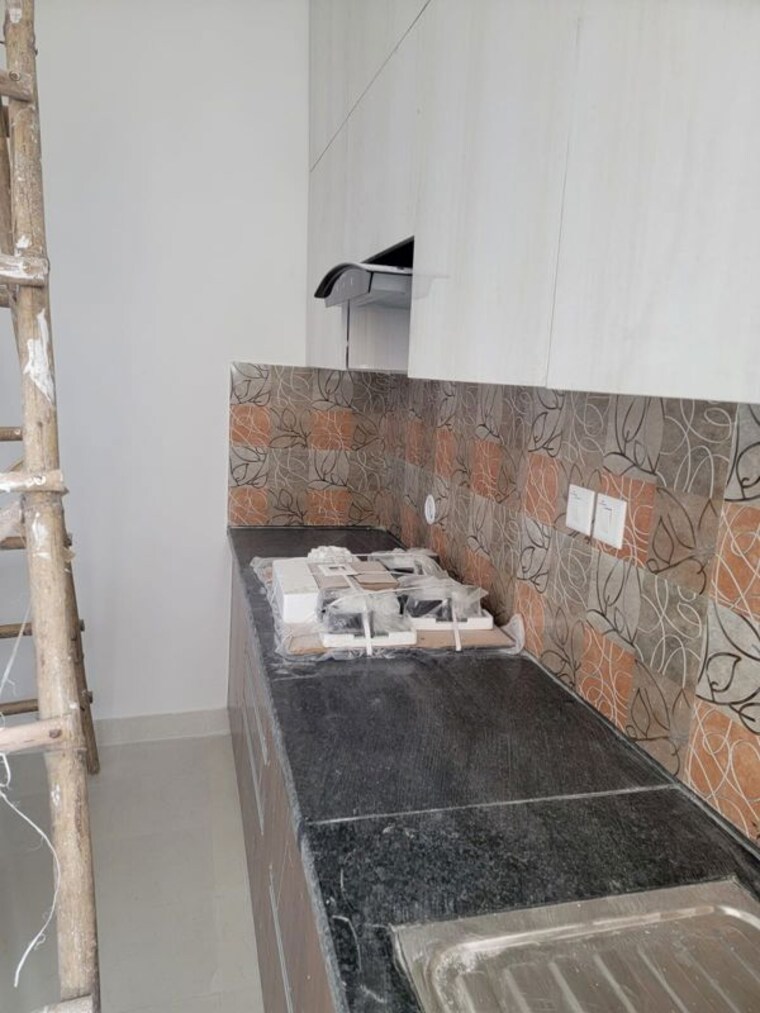 Kitchen, shapoorji-pallonji-joyville-gurgaon 3 Bedroom 1692 Sq.Ft. Apartment In Sector 102 Gurgaon 10481518