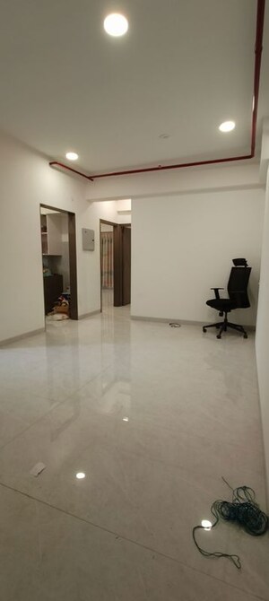Living Room in 2 BHK Apartment at Rander Komal Kounteya CHS, Borivali West – for Sale