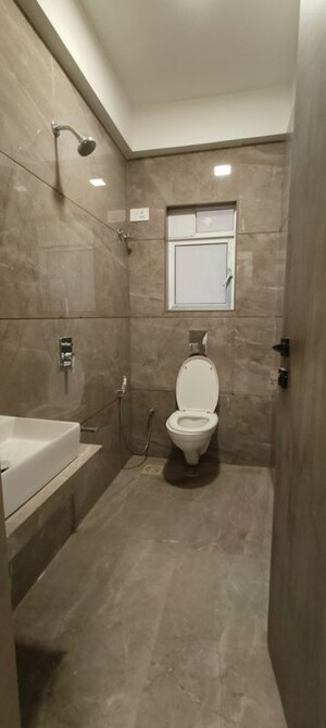 Bathroom in 2 BHK Apartment at Rander Komal Kounteya CHS, Borivali West – for Sale
