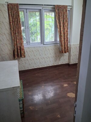 Room in 2 BHK Apartment at Maharaja Surajmal Apartment, Andheri West – for Rent
