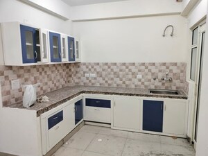 Kitchen in 2 BHK Apartment at Panchsheel Greens II, Sector 16 Greater Noida – for Rent