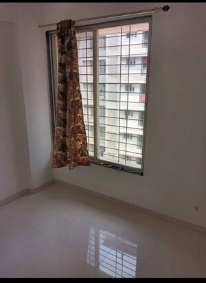 Room in 2 BHK Apartment at Shree Nidhi Phase 2 A Wing, Lohgaon – for Rent