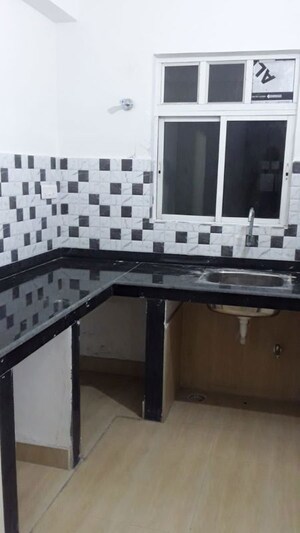Kitchen in 2 BHK Apartment at Merlin Maximus, Sodepur – for Sale
