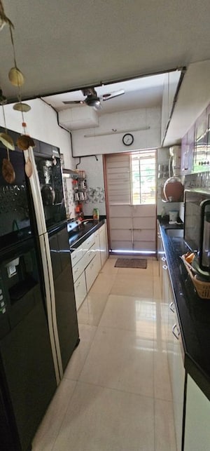 Kitchen in 2.5 BHK Apartment at Shah Arcade II, Malad East – for Rent