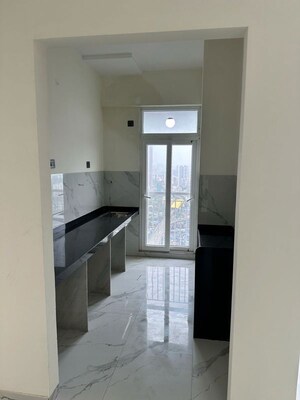 Kitchen in 2 BHK Apartment at Ruparel Sky Green, Kandivali West – for Sale
