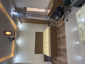 Living Room in 1 BHK Apartment at Supertech Czar Suites, Omicron I Greater Noida – for Rent