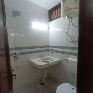 Bathroom in 3 BHK Builder Floor at Kalkaji – for Rent