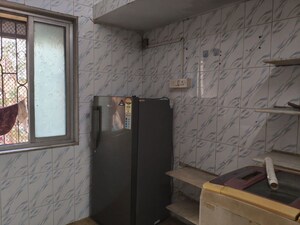 Kitchen in 1 BHK Apartment at Dak Sangathan CHS, Malad East – for Rent
