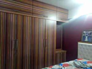 Bedroom in 2 BHK Apartment at Sector 18 Kopar Khairane – for Rent