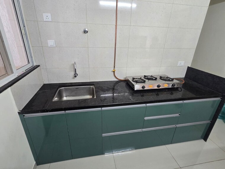 Kitchen, kolte-patil-r1-life-republic 2.5 Bedroom 870 Sq.Ft. Apartment In Hinjewadi Pune 10482371