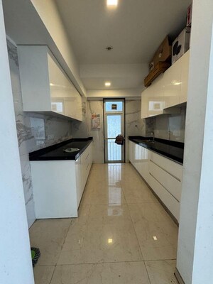 Kitchen in 2 BHK Apartment at Ruparel Ariana, Parel – for Rent