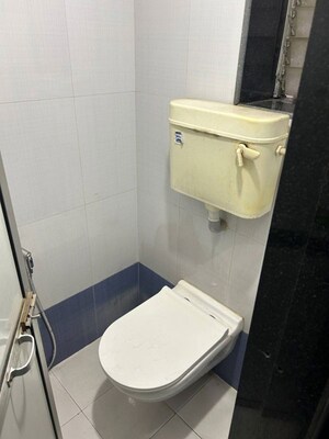 Bathroom in 1 BHK Apartment at Vasant Valley Complex, Malad East – for Rent