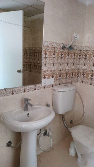 Bathroom in 2 BHK Apartment at Gaur City 7th Avenue, Sector 4 Greater Noida – for Rent