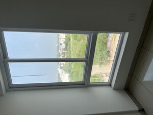 Room in 2 BHK Apartment at Care The Alien Court, Trans Delhi Signature City – for Rent