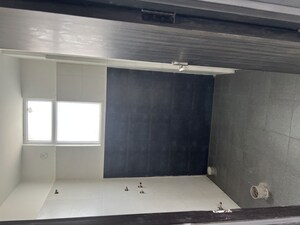 Washroom in 2 BHK Apartment at Care The Alien Court, Trans Delhi Signature City – for Rent