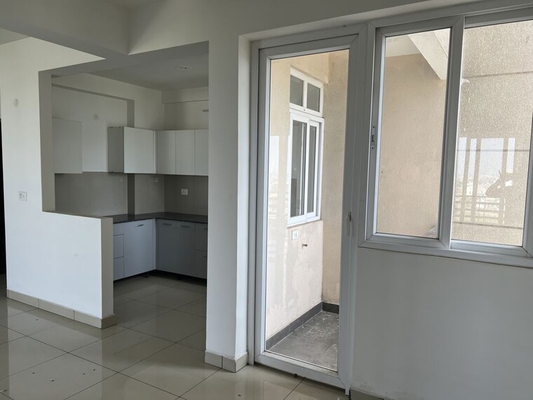 Kitchen, care-the-alien-court 2 Bedroom 1250 Sq.Ft. Apartment In Trans Delhi Signature City Ghaziabad 10482469