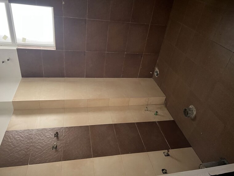 Bathroom, care-the-alien-court 2 Bedroom 1250 Sq.Ft. Apartment In Trans Delhi Signature City Ghaziabad 10482469