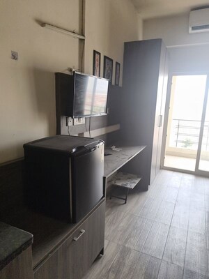 Kitchen in 1 RK Apartment at Paramount Golf Forest Studio Apartments - OAK Towe, Zeta I Greater Noida – for Rent