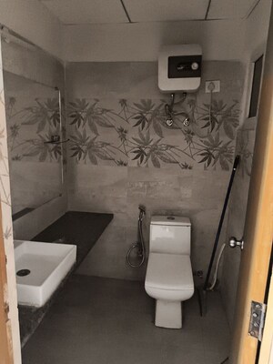 Bathroom in 1 RK Apartment at Paramount Golf Forest Studio Apartments - OAK Towe, Zeta I Greater Noida – for Rent