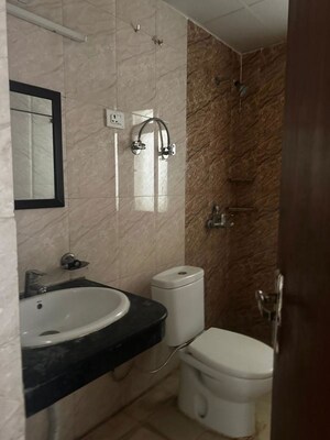Bathroom in 3 BHK Apartment at Nimbus The Golden Palm, Sector 168 – for Rent