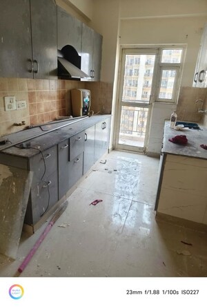 Kitchen in 3 BHK Apartment at Aims Golf Avenue I, Sector 75 – for Rent