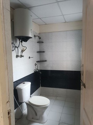 Bathroom in 3 BHK Apartment at Aims Golf Avenue I, Sector 75 – for Rent