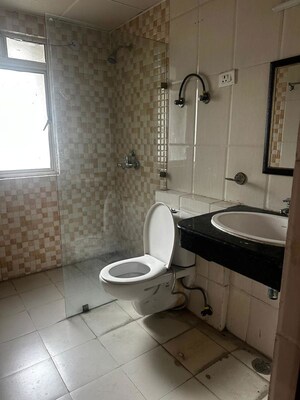 Bathroom in 3 BHK Apartment at Nimbus The Golden Palm, Sector 168 – for Rent