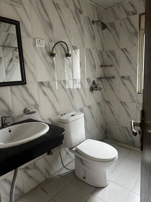 Bathroom in 3 BHK Apartment at Nimbus The Golden Palm, Sector 168 – for Rent