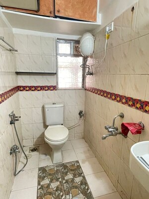Bathroom in 2 BHK Apartment at Greenfields Apartments, Santacruz East – for Rent