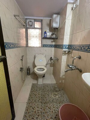 Bathroom in 2 BHK Apartment at Greenfields Apartments, Santacruz East – for Rent