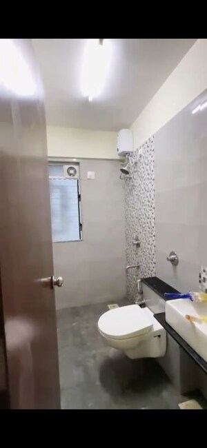 Bathroom in 2 BHK Apartment at Ani Anu Sri Balaji Enclave, Malad West – for Rent
