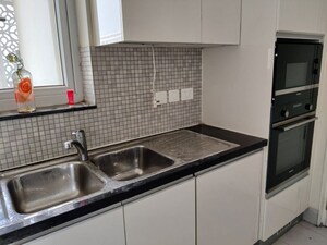 Kitchen in 3.5 BHK Apartment at DLF The Ultima, Sector 81 – for Sale