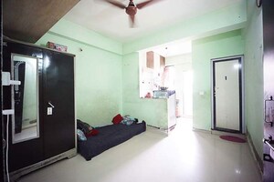Living Room in 1 BHK Apartment at Ellisbridge – for Sale