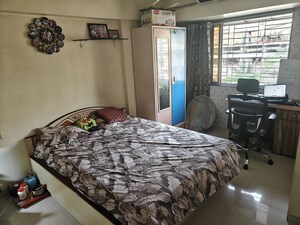 Bedroom in 2 BHK Apartment at Shivraise Apartment, Kandivali East – for Rent