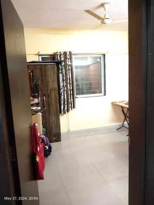 Room in 2 BHK Apartment at Wakad – for Sale
