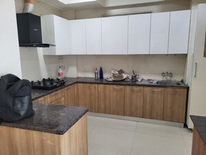 Kitchen in 4 BHK Apartment at Parx Laureate, Sector 108 – for Rent